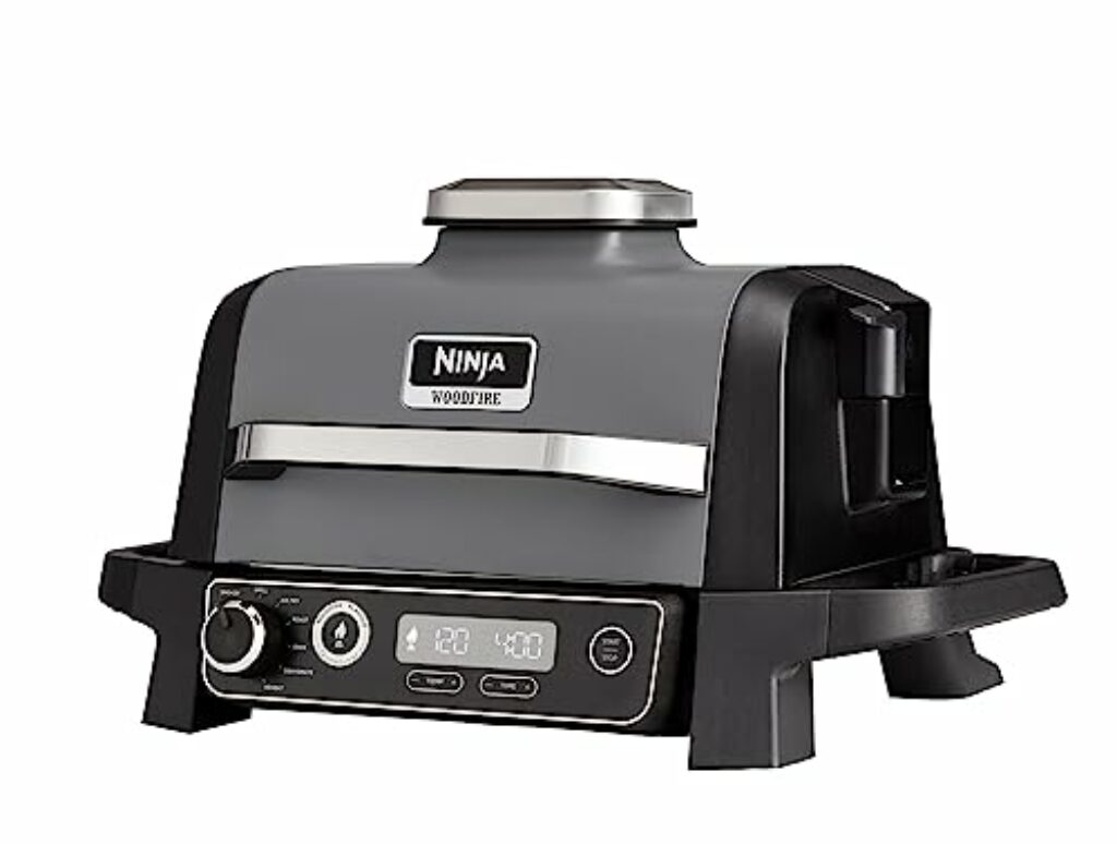 Ninja Woodfire Elektrogrill, Camping Grill, Smoker-& Heißluftfritteuse, 7-in-1-Outdoor Grill, räuchern, braten, backen, antihaftbeschichtet, tragbar, Geschenk für Männer/Frauen, Grau/Schwarz OG701EU